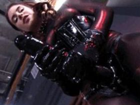 Strap-on in a guy's ass and fisting his ass by hand