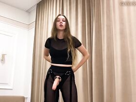 Young blonde puts on a strap-on, intending to fuck her friend's ass
