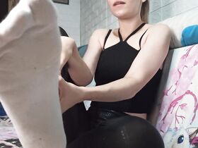 Slave worships the dirty socks of his young mistress