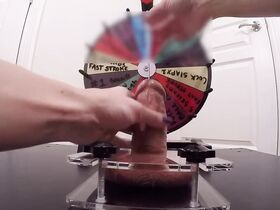 Makes a slave cum by hand, aiming the cum at a target